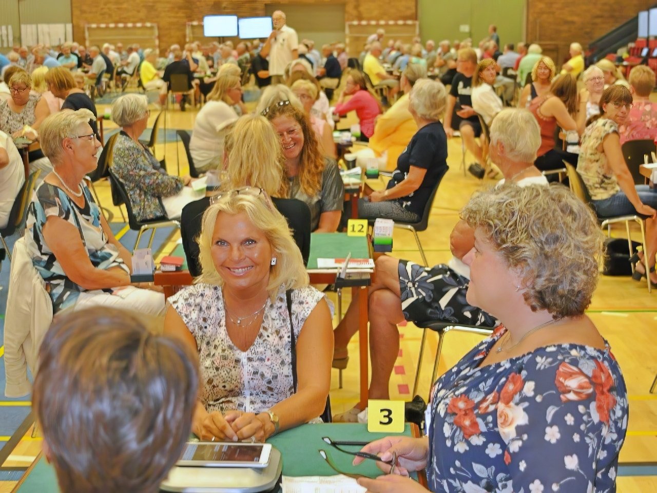 Bridge players enjoying a tournament at a local club.