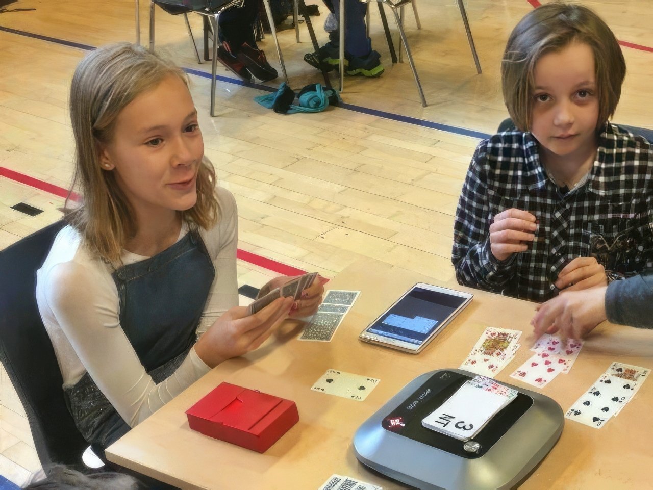 A social gathering centered around a game of bridge.